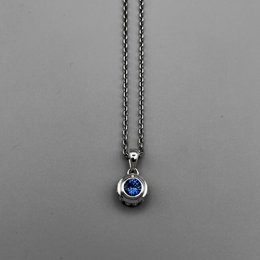 TRIPLE X STUDS SOLITAIRE BIRTHDAY 5mm STONE PENDANT / XP-214SAG