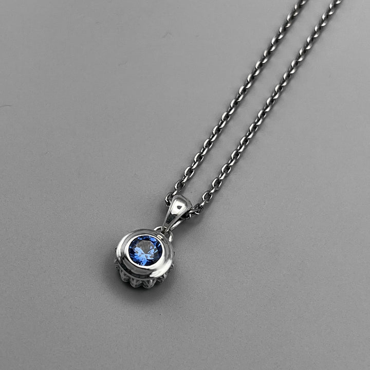 TRIPLE X STUDS SOLITAIRE BIRTHDAY 5mm STONE PENDANT / XP-214SAG