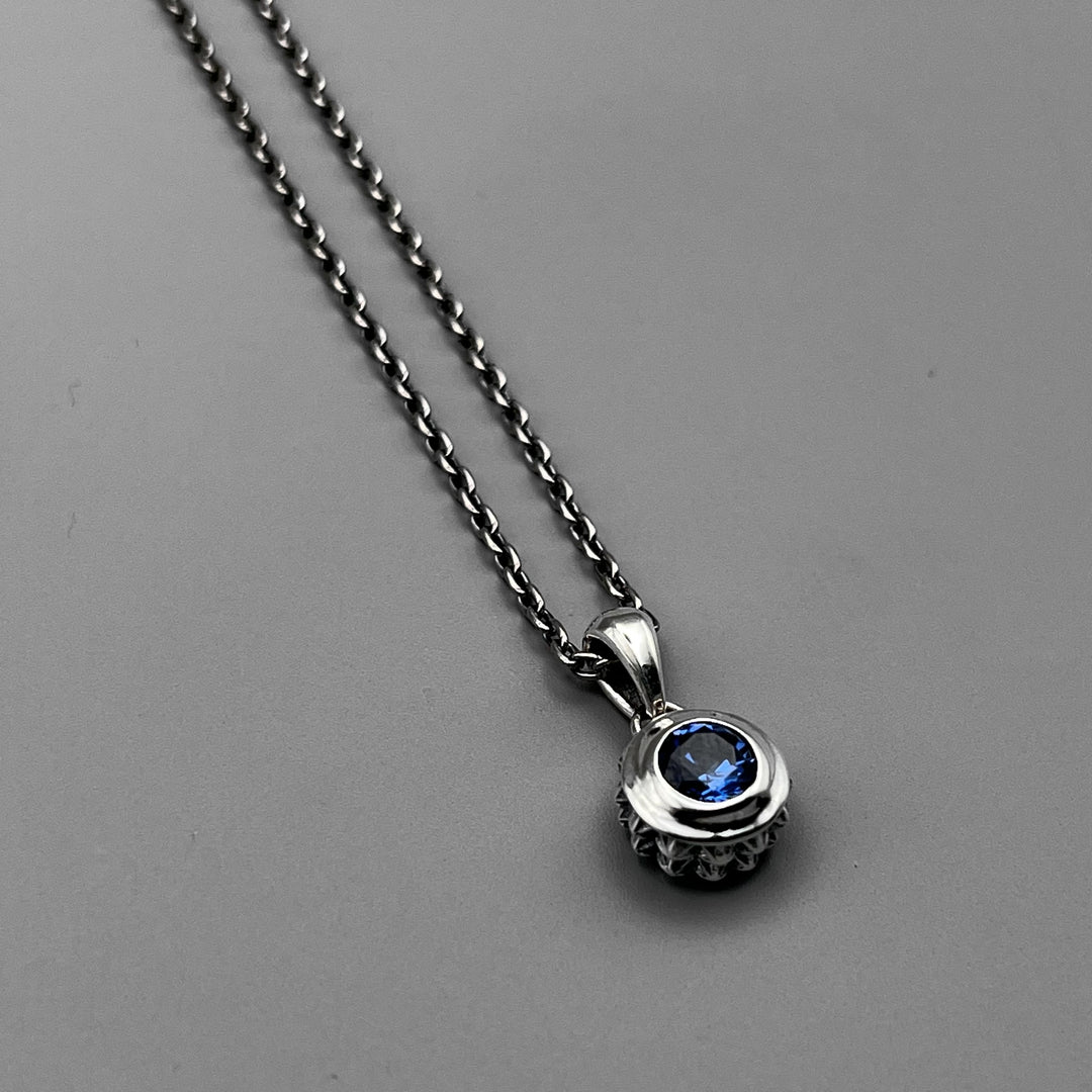 TRIPLE X STUDS SOLITAIRE BIRTHDAY 5mm STONE PENDANT / XP-214SAG
