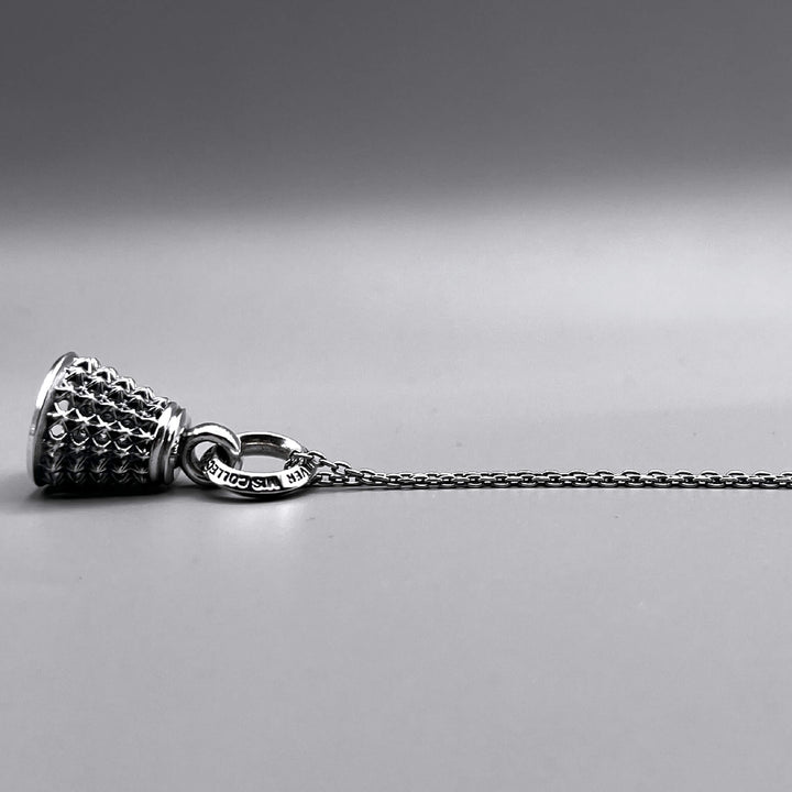 TRIPLE X BELL PENDANT