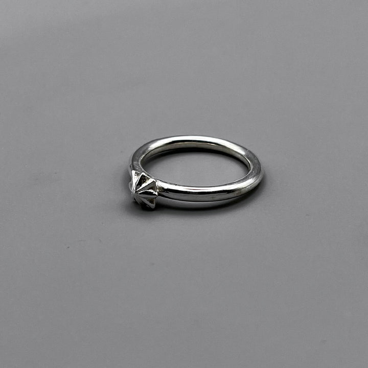 TRIPLE X STUDS SOLITIRE RING